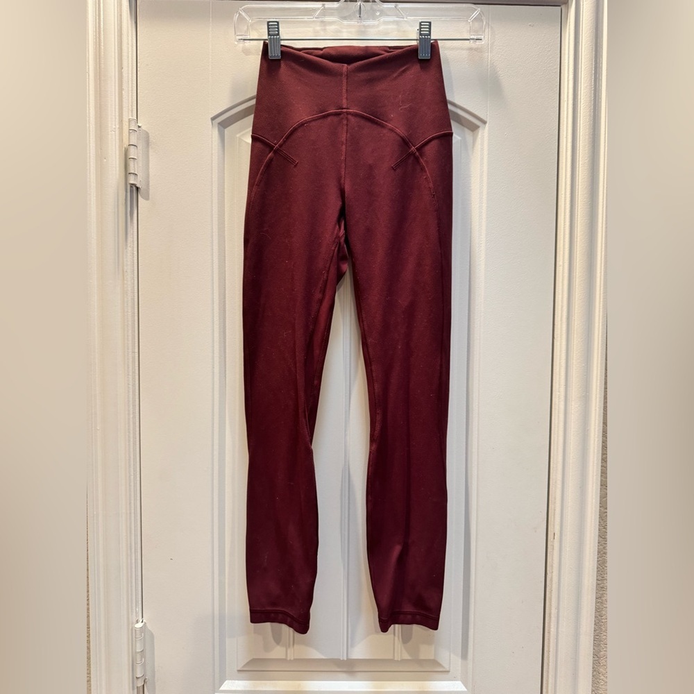 Lululemon Unlimit High-Rise Tight 25" in Red Merlot